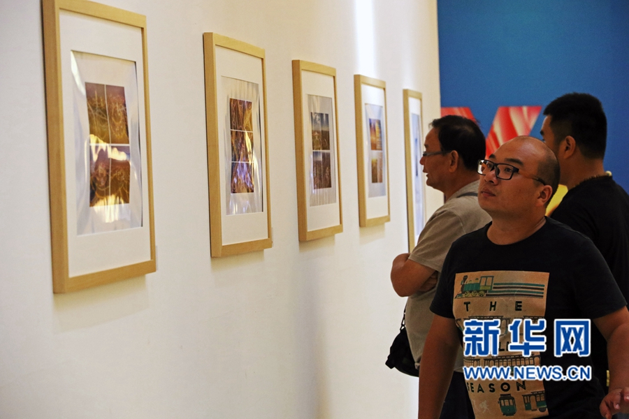 鄭州首個城市風光攝影展《鄭.城.長》開展 鄭州首個城市風光攝影展《鄭.城.長》開展