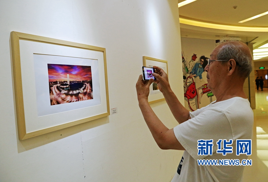 鄭州首個城市風光攝影展《鄭.城.長》開展 鄭州首個城市風光攝影展《鄭.城.長》開展